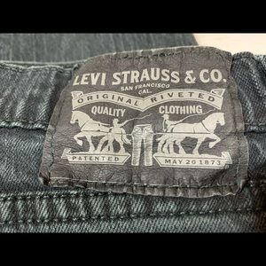 Levi’s 511 black 33x32 slim distressed denim with paint splatter 1103